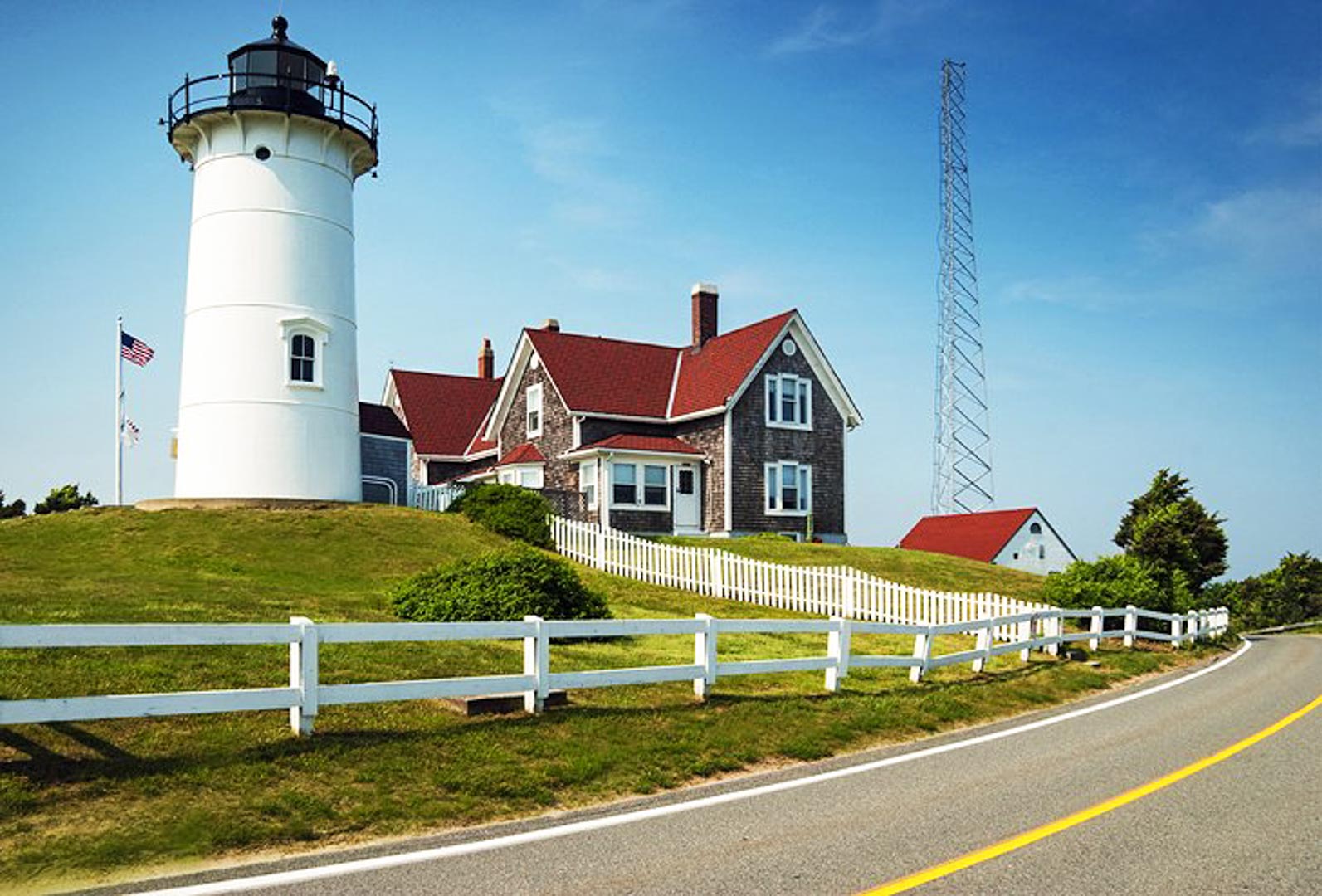 A scenic view of a lighthouse at VRI's Riverview Resort in South Yarmouth, Massachusetts.